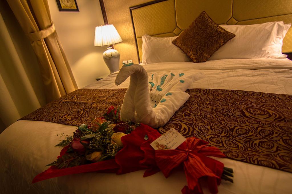 Rest Night Serviced Apartments- Alhamra Рияд Стая снимка A towel swan