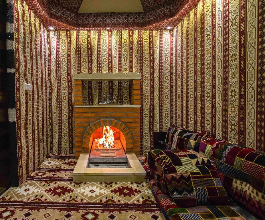 Rest Night Serviced Apartments- Alhamra Рияд Екстериор снимка A majlis with a fireplace